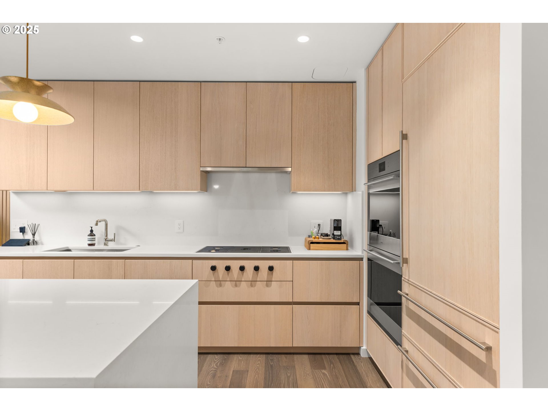 550 Southwest 10th Avenue, Unit 3003 Portland, OR 97205 - Photo 6 of 44 a kitchen with stainless steel appliances granite countertop a sink stove and refrigerator