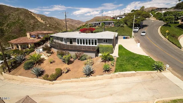a view of a terrace with yard