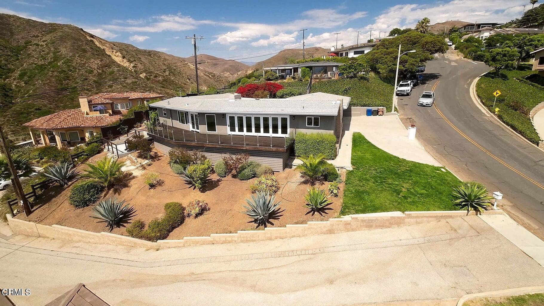 3026 Hilltop Drive Ventura, CA 93003 - Photo 19 of 31 a view of a house with a yard