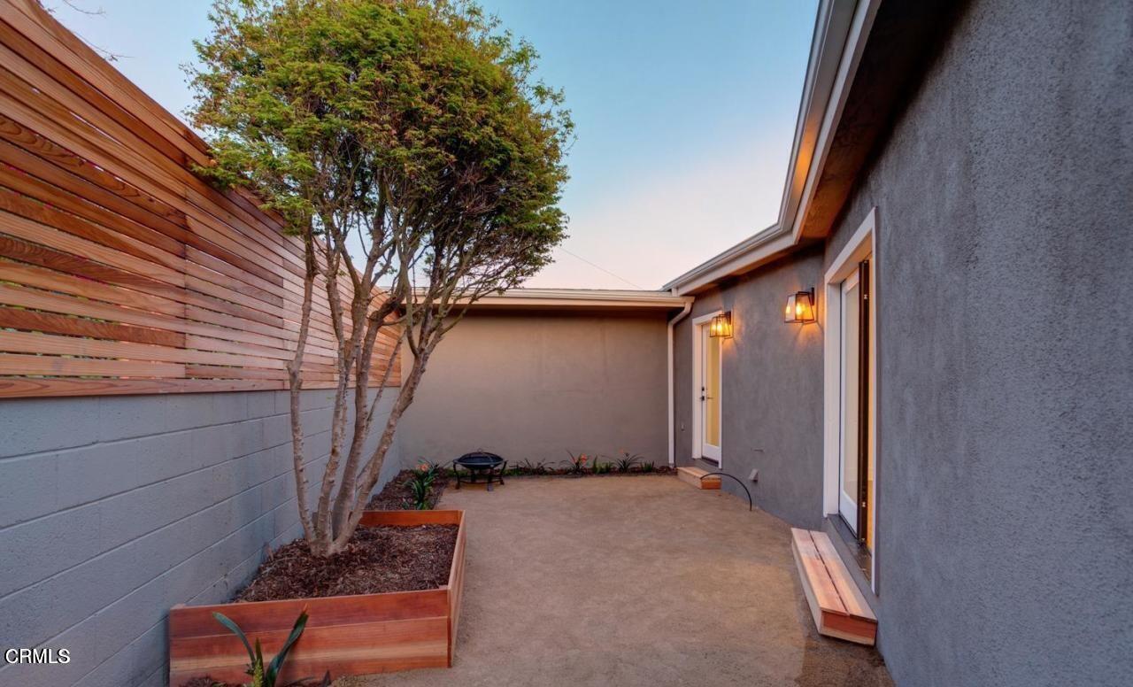 3026 Hilltop Drive Ventura, CA 93003 - Photo 27 of 31 a backyard of a house with seating space