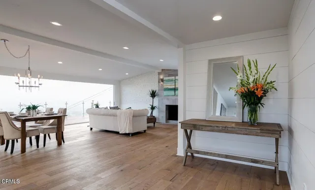 a living room with furniture and a table