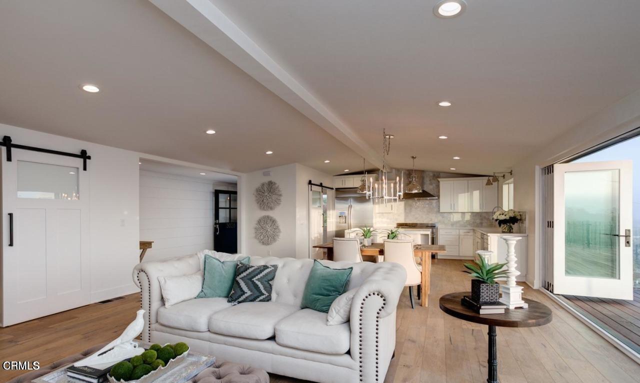 3026 Hilltop Drive Ventura, CA 93003 - Photo 9 of 31 a living room with furniture and a view of kitchen
