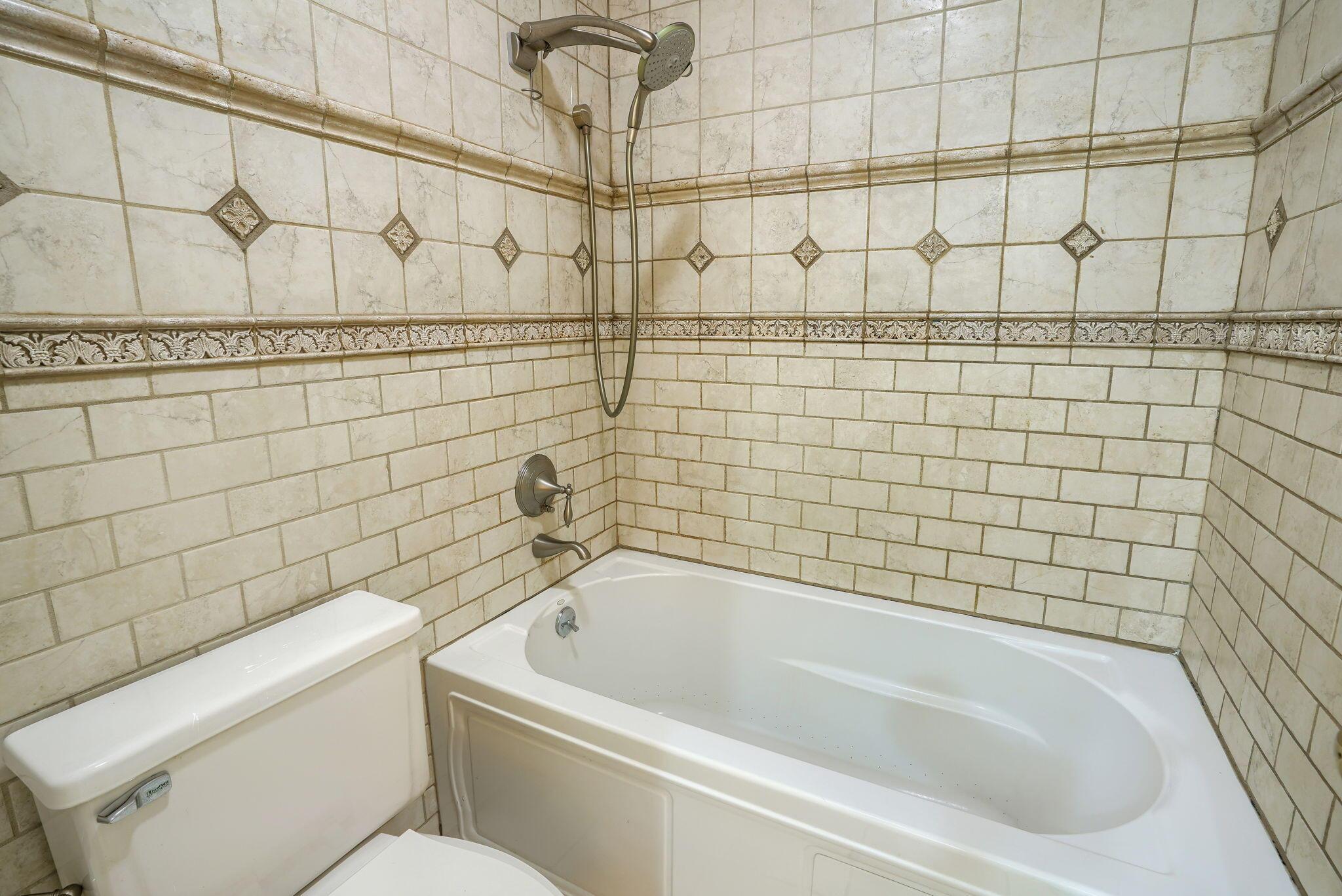 2207 Sandston Road Columbus, OH 43220 - Photo 23 of 48 OWNER'S SOAKING TUB/SHOWER