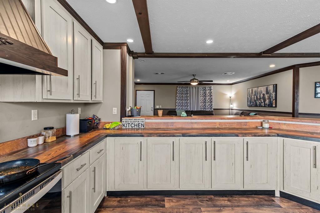 4638 Benton Road Bossier City, LA 71111 - Photo 15 of 34 a kitchen with stainless steel appliances granite countertop a sink and cabinets