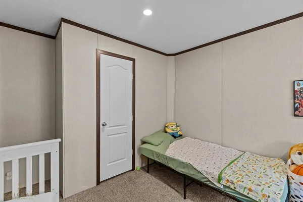 a bedroom with a workspace