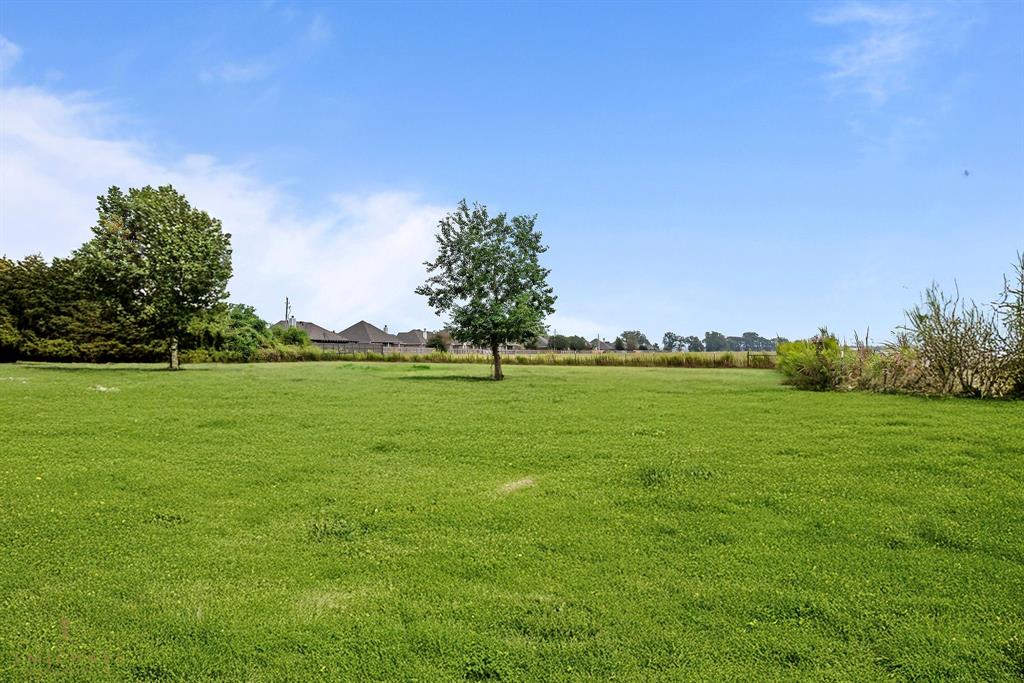 4638 Benton Road Bossier City, LA 71111 - Photo 5 of 34 a view of field with grass