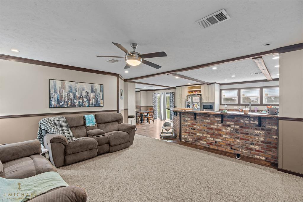 4638 Benton Road Bossier City, LA 71111 - Photo 7 of 34 a living room with furniture and a large window