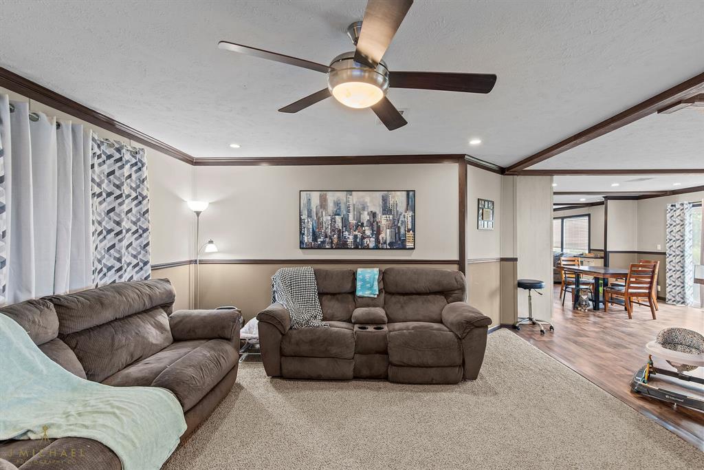 4638 Benton Road Bossier City, LA 71111 - Photo 8 of 34 a living room with furniture and a large window