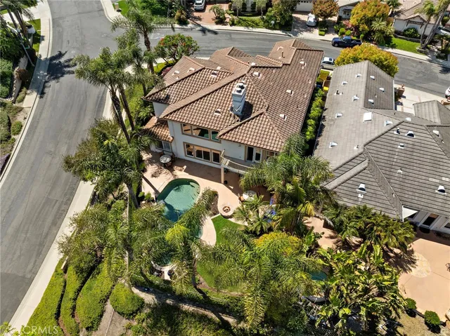 a view of a city with mountains in the background