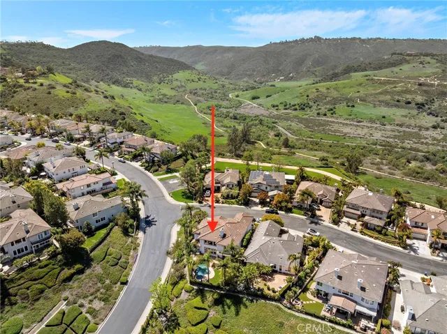 a view of a park with large trees