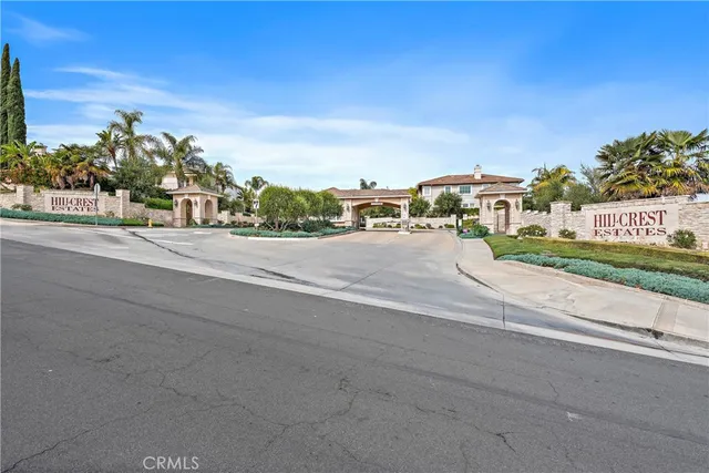 a view of a wooden house with a yard