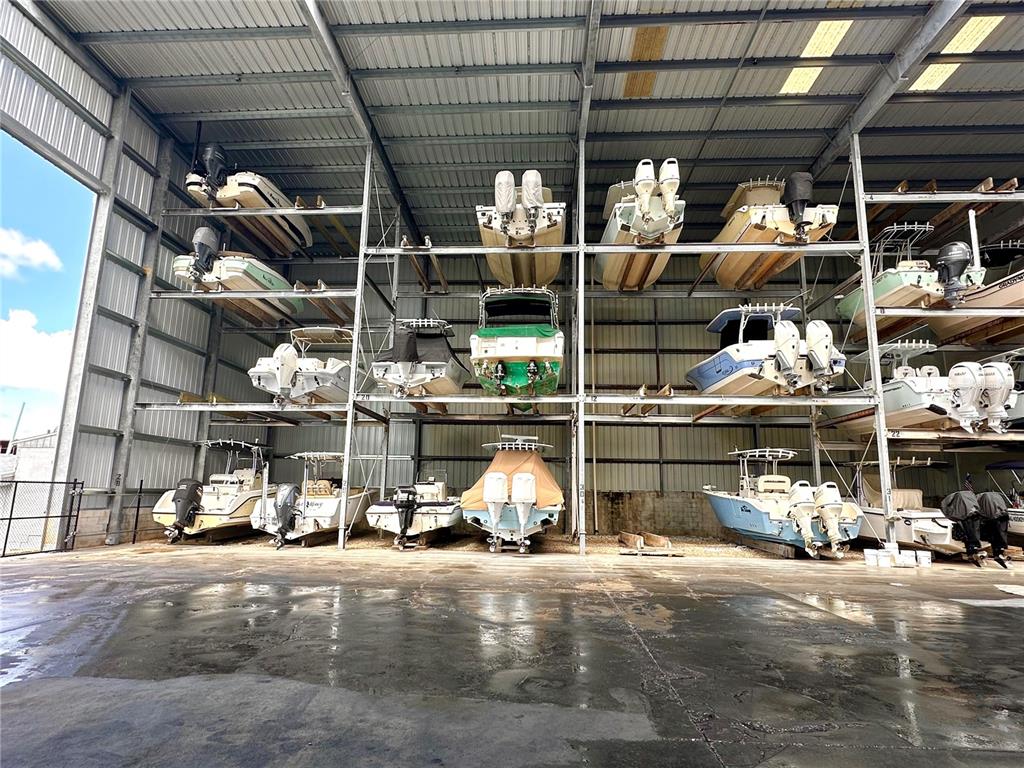 100 Circuit Road, Unit N110 Nokomis, FL 34275 - Photo 7 of 10 a view of store room with racks