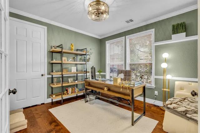 a reading room with furniture and a window