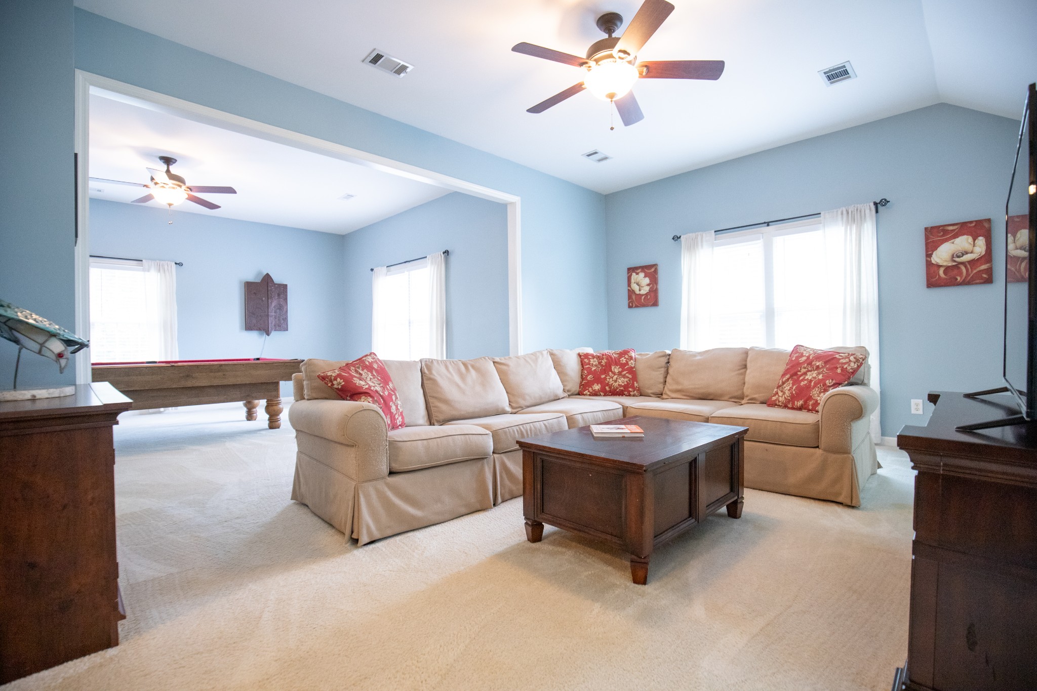 113 Chester Stevens Road Franklin, TN 37067 - Photo 23 of 31 a living room with furniture and a chandelier