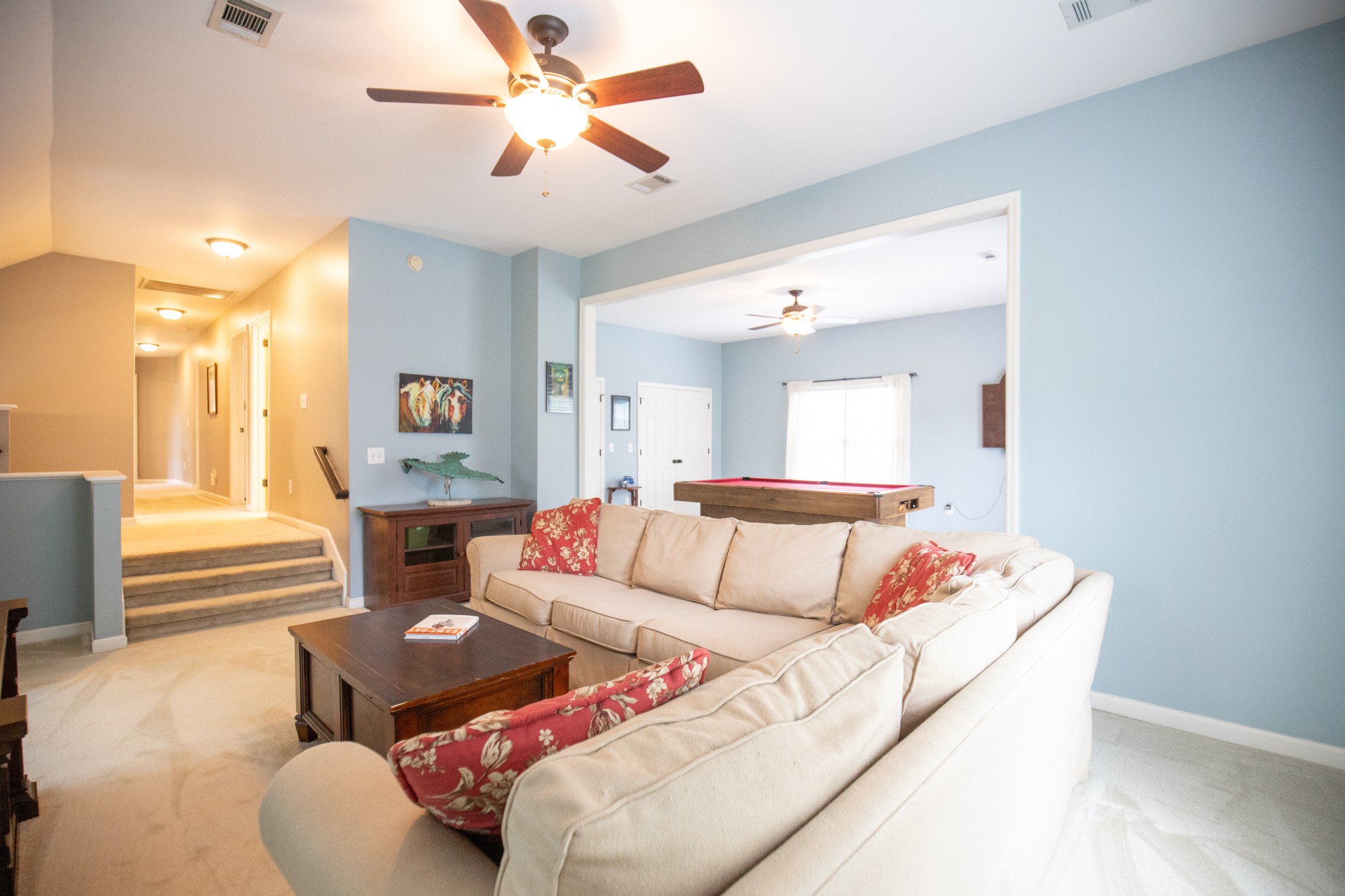 113 Chester Stevens Road Franklin, TN 37067 - Photo 24 of 31 a living room with furniture and a wooden floor