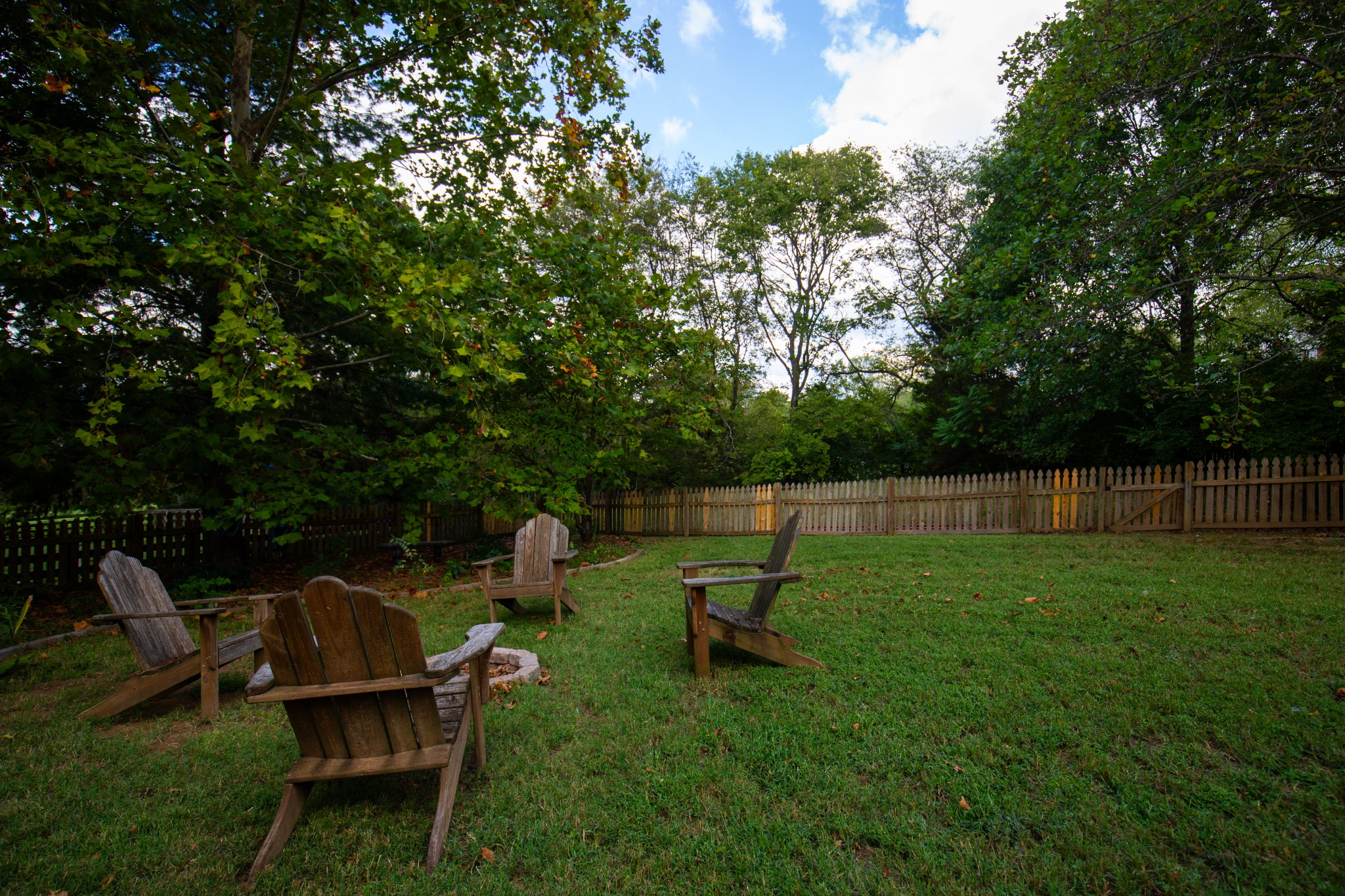 113 Chester Stevens Road Franklin, TN 37067 - Photo 29 of 31 a backyard of a house with table and chairs