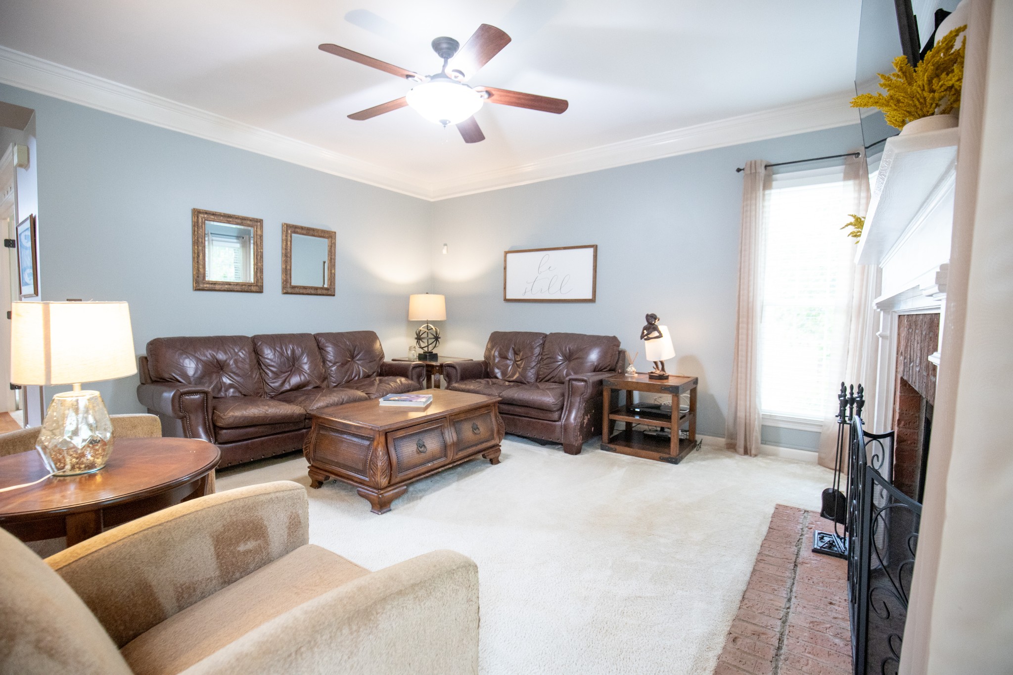 113 Chester Stevens Road Franklin, TN 37067 - Photo 9 of 31 a living room with furniture and a chandelier