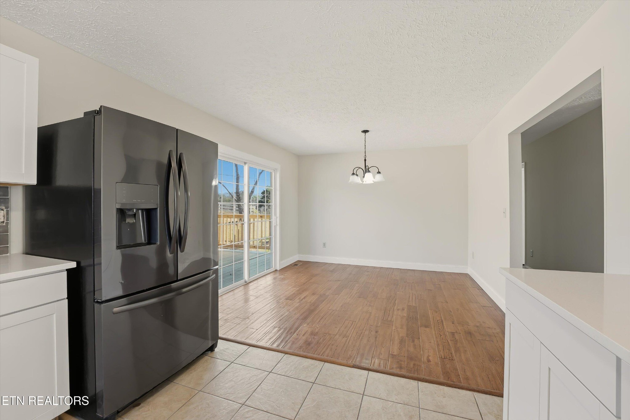 5413 Pryor Road Maryville, TN 37804 - Photo 15 of 33 a kitchen with stainless steel appliances a refrigerator and a stove top oven