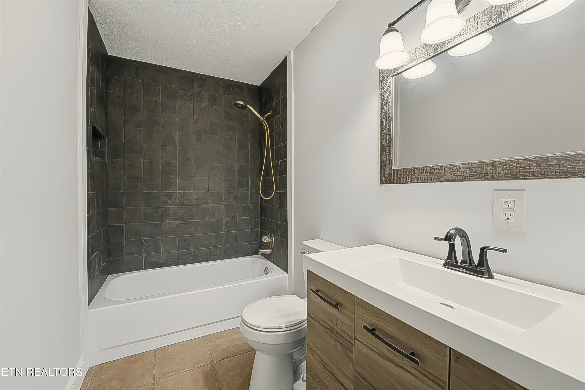 5413 Pryor Road Maryville, TN 37804 - Photo 20 of 33 a bathroom with a sink a toilet and shower