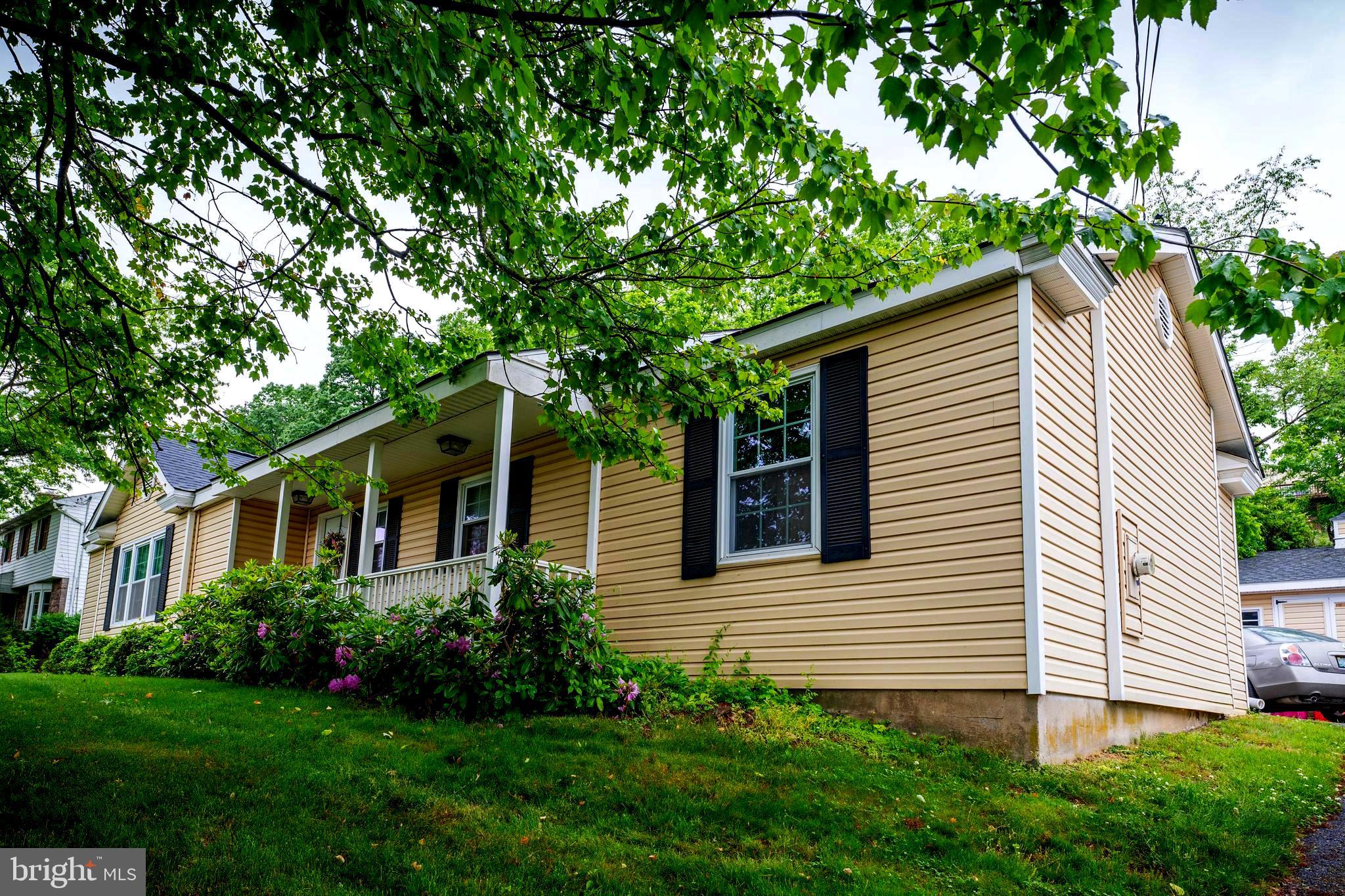 2941 Pheasant Run Road Norristown, PA 19403 - Photo 3 of 23 a view of a house with a yard and potted plants