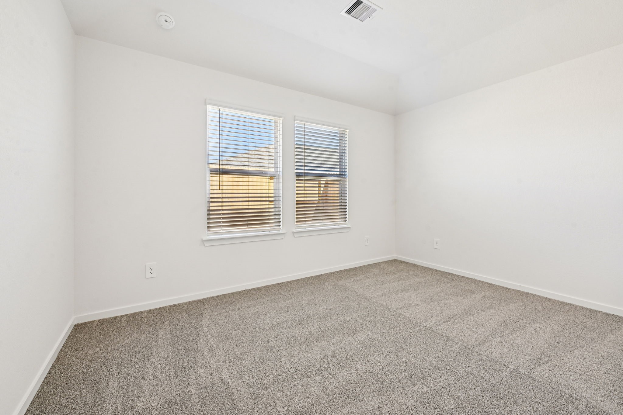 14147 Granger Pointe Lane Conroe, TX 77302 - Photo 17 of 35 a view of an empty room with a window