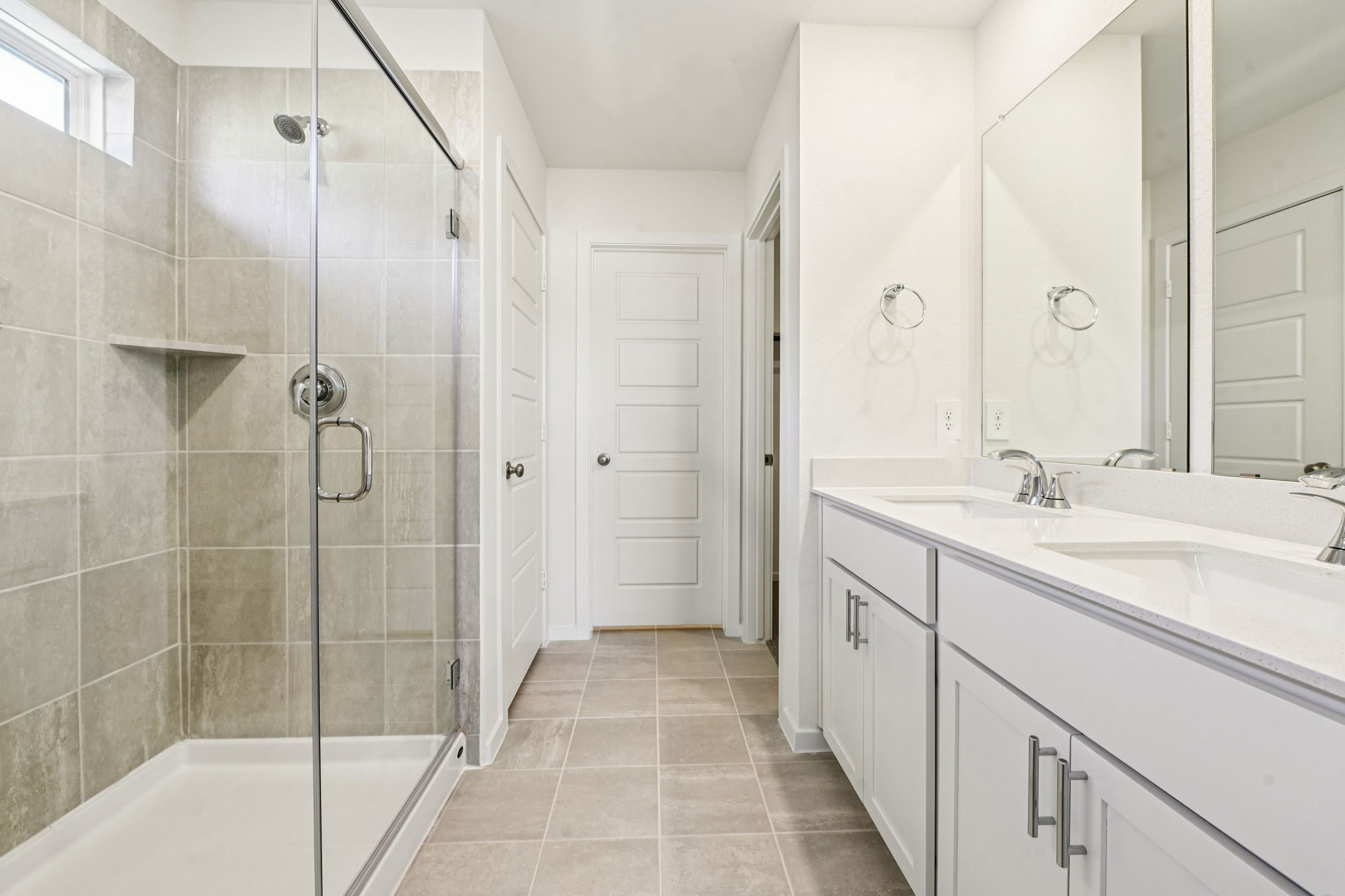 14147 Granger Pointe Lane Conroe, TX 77302 - Photo 19 of 35 a spacious bathroom with a shower and a sink