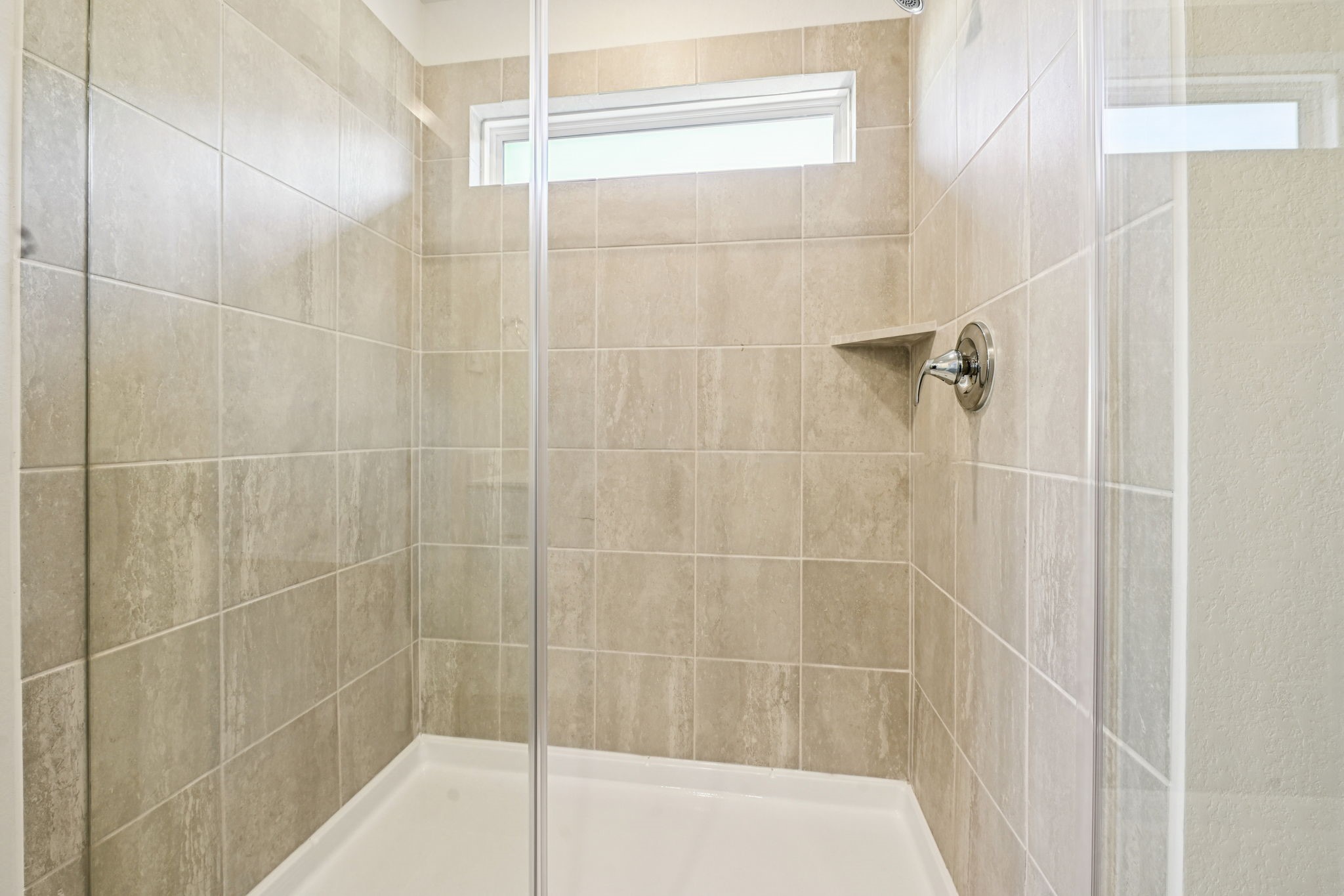 14147 Granger Pointe Lane Conroe, TX 77302 - Photo 20 of 35 a bathroom with a shower