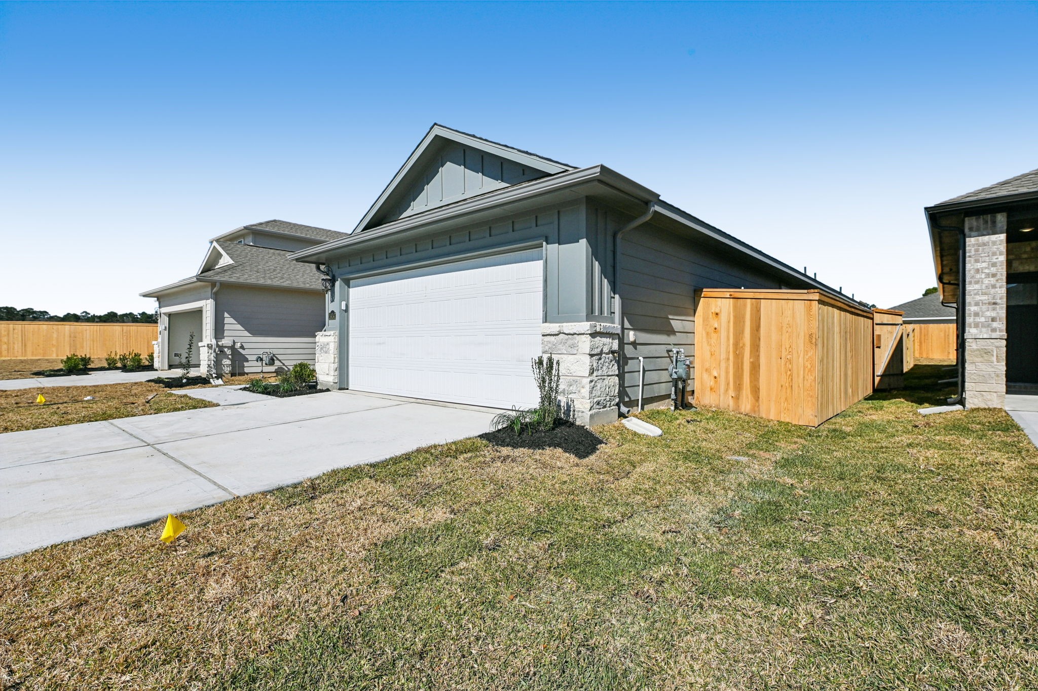 14147 Granger Pointe Lane Conroe, TX 77302 - Photo 2 of 35 a house view with a outdoor space