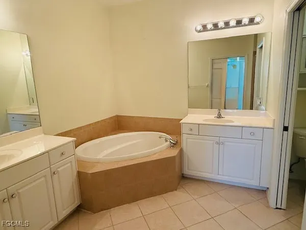 $324,900 | 3977 Bishopwood Court East, Unit 203, Naples, FL 34114