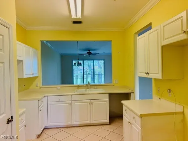 $324,900 | 3977 Bishopwood Court East, Unit 203, Naples, FL 34114