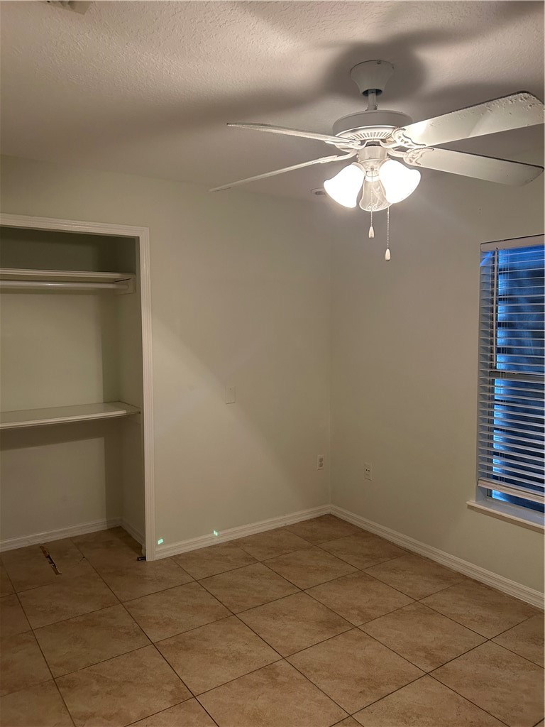 486 Biscayne Lane Sebastian, FL 32958 - Photo 5 of 15 a view of a room with a ceiling fan and a window