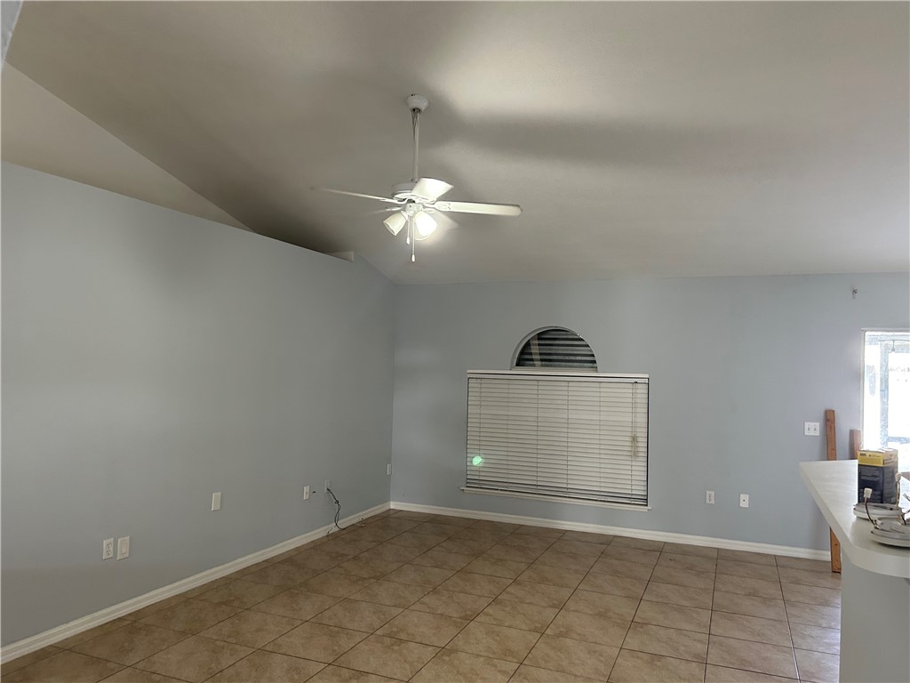 486 Biscayne Lane Sebastian, FL 32958 - Photo 9 of 15 a view of a room with a ceiling fan and window
