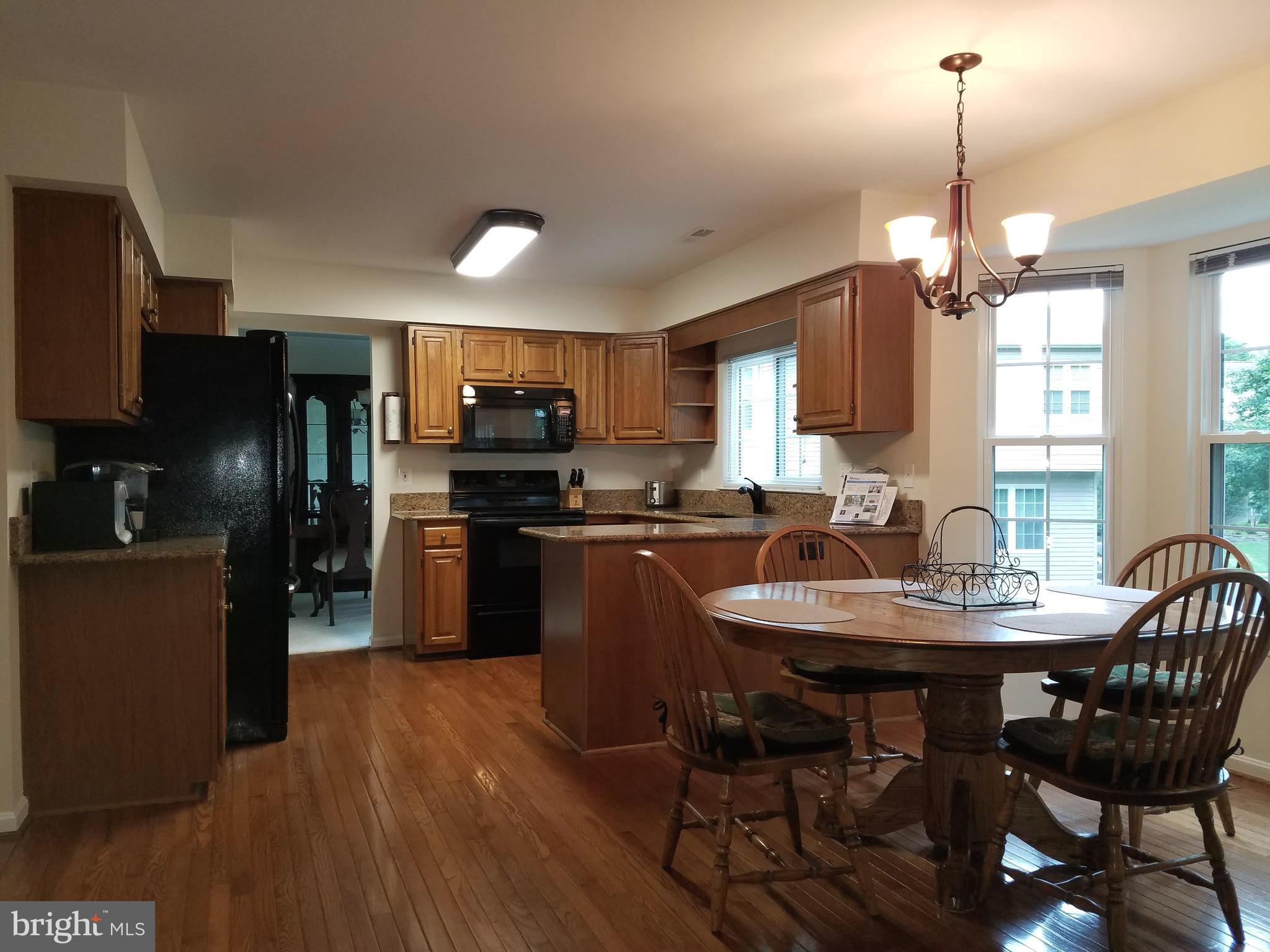 21288 Mirror Ridge Place Sterling, VA 20164 - Photo 5 of 28 Kitchen with open concept