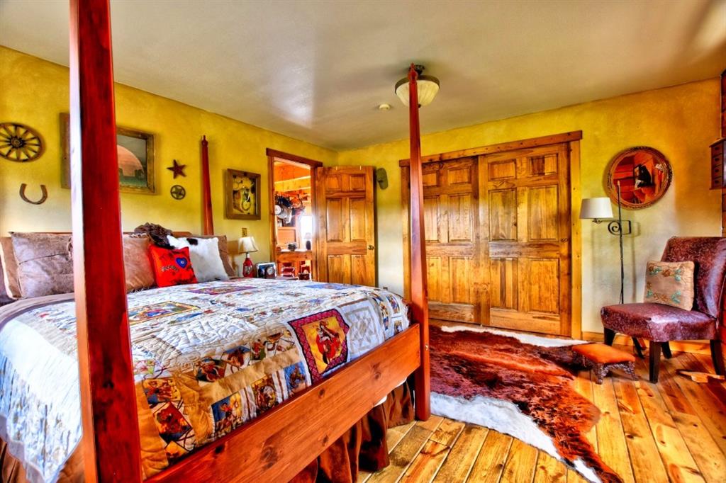 8614 Remington Road Como, CO 80432 - Photo 27 of 35 a bedroom with a bed and a window