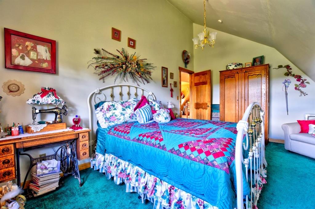 8614 Remington Road Como, CO 80432 - Photo 32 of 35 a bedroom with furniture and a small area