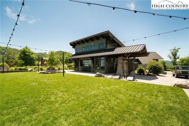a view of an outdoor sitting area with furniture