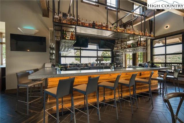 a view of a lake with a yard