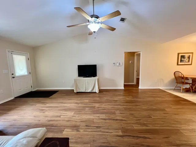 a view of a livingroom with a flat screen tv