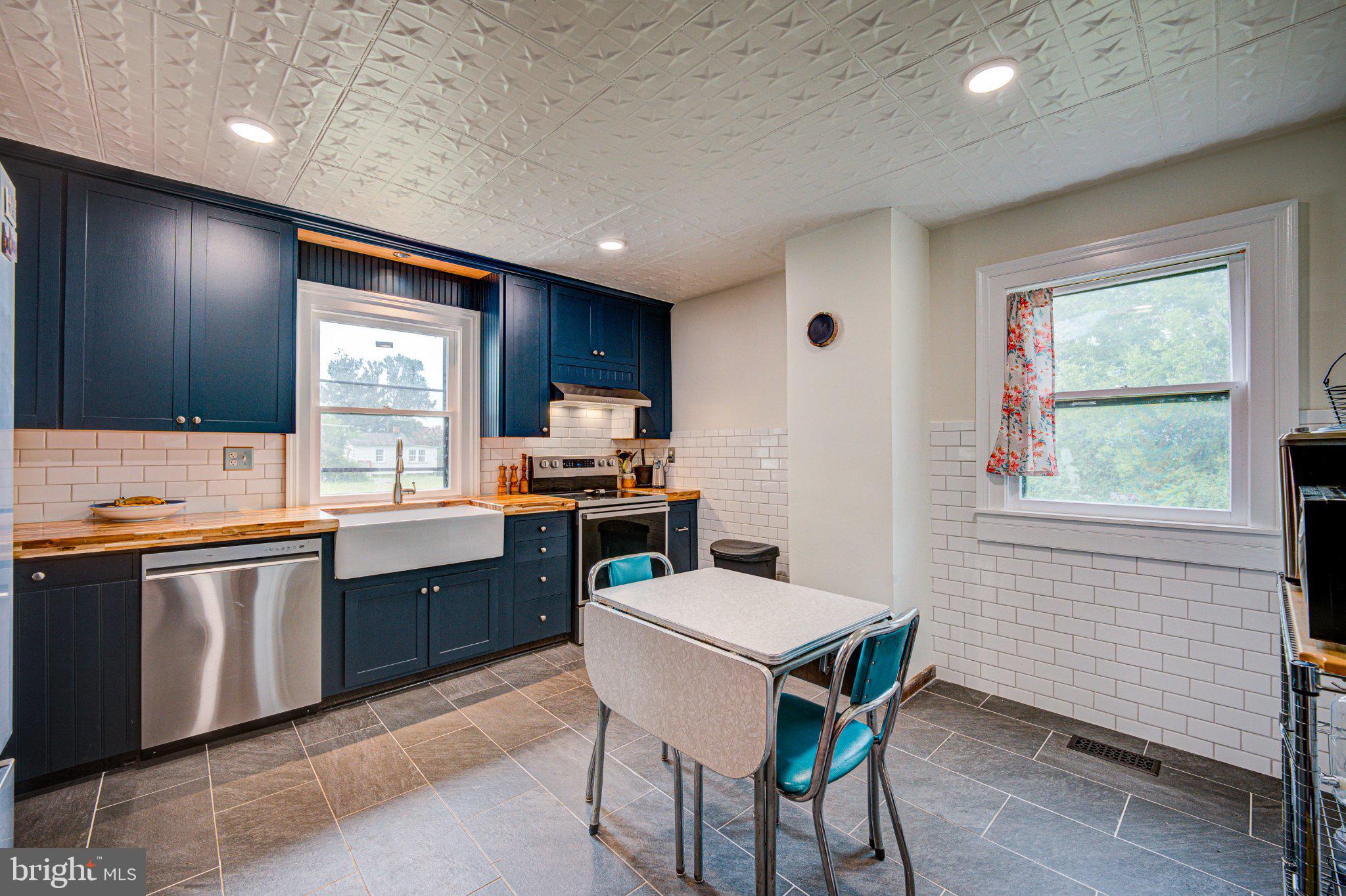 24177 Rapidan Road Mitchells, VA 22729 - Photo 6 of 43 Charming kitchen with modern flair.