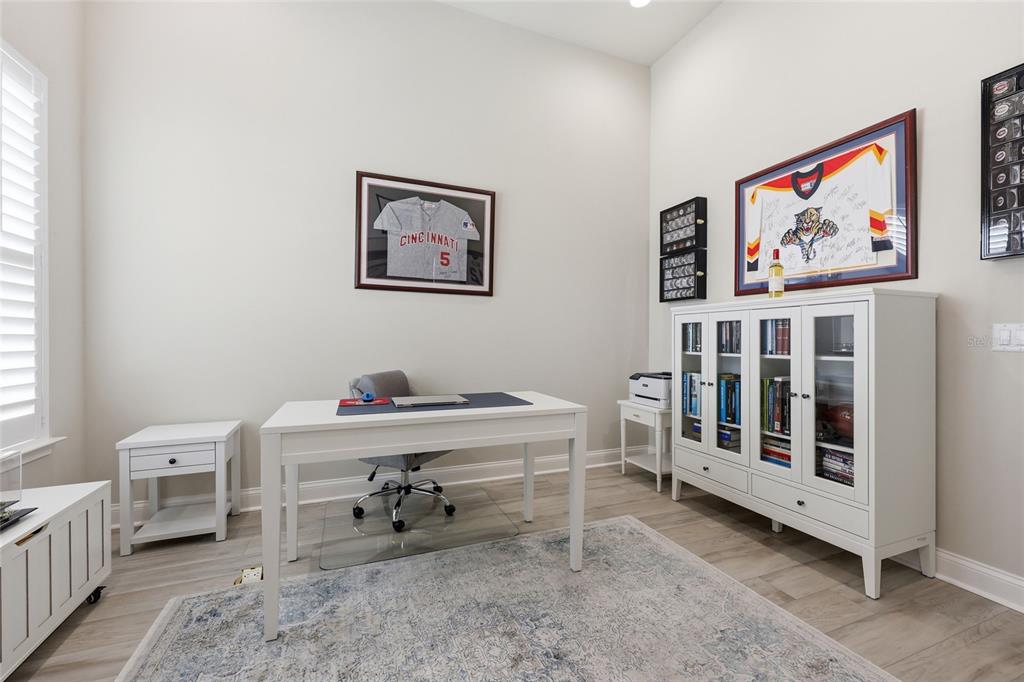 10776 Southwest 36th Place Gainesville, FL 32608 - Photo 21 of 44 a workspace with furniture