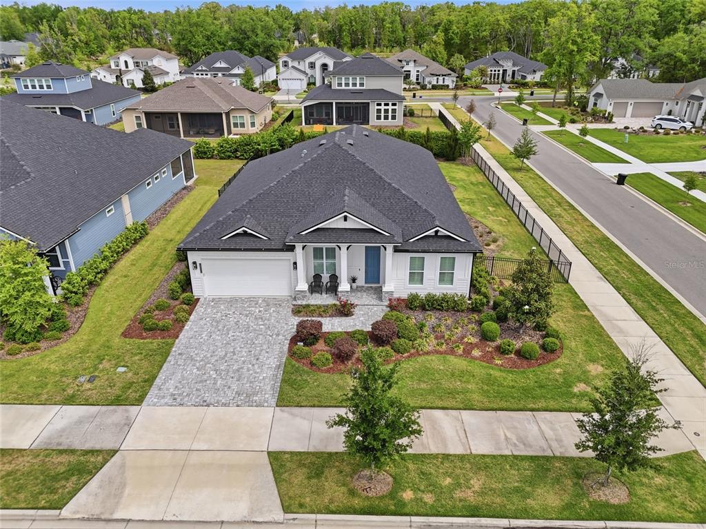 10776 Southwest 36th Place Gainesville, FL 32608 - Photo 39 of 44 a aerial view of a house with a yard
