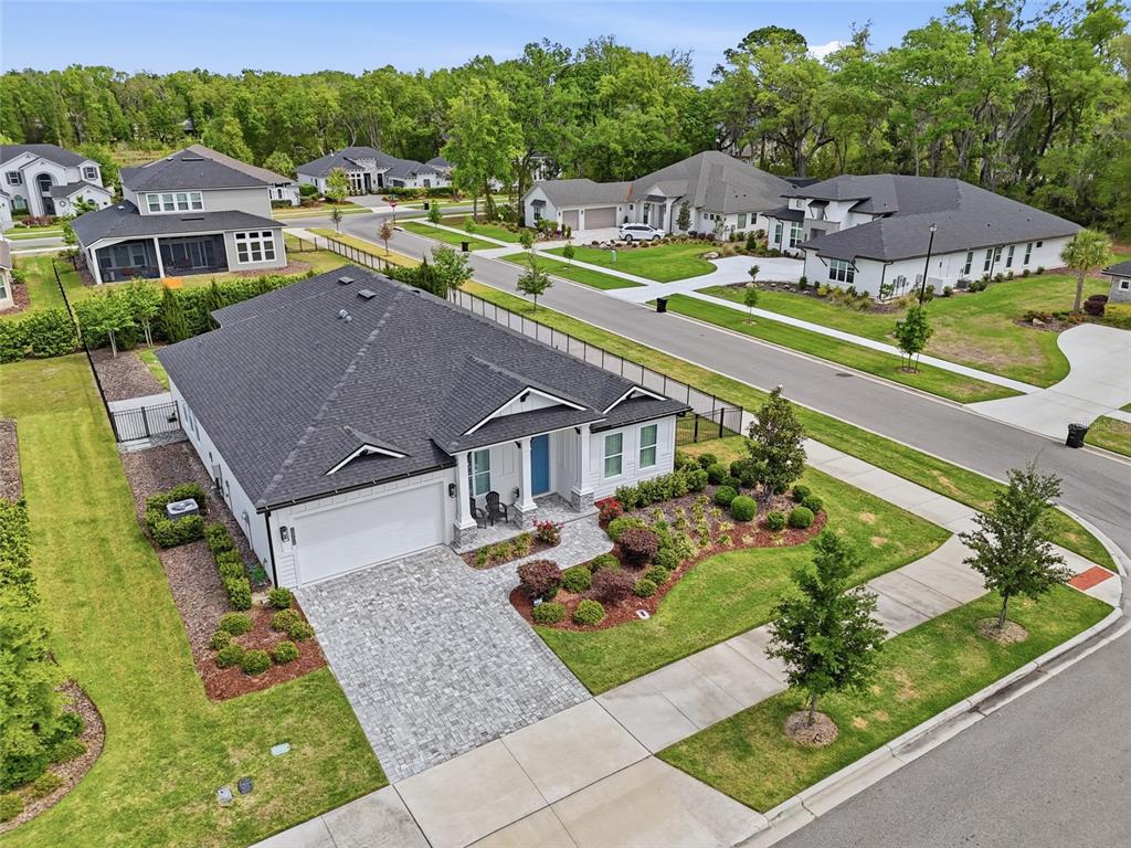 10776 Southwest 36th Place Gainesville, FL 32608 - Photo 40 of 44 an aerial view of a house with a garden