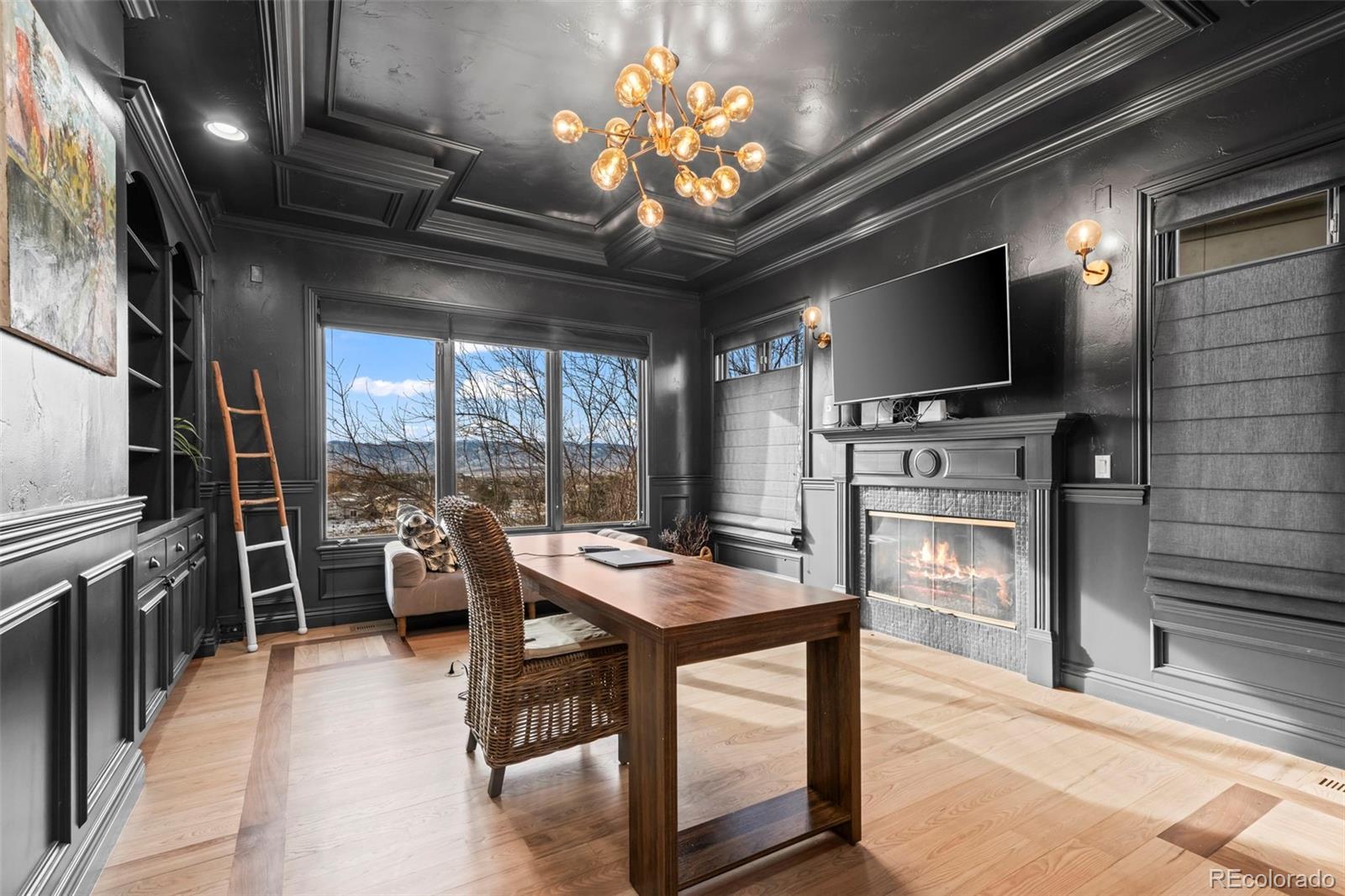1012 Michener Way Highlands Ranch, CO 80126 - Photo 15 of 50 a very nice looking dining room with a large window and a kitchen view