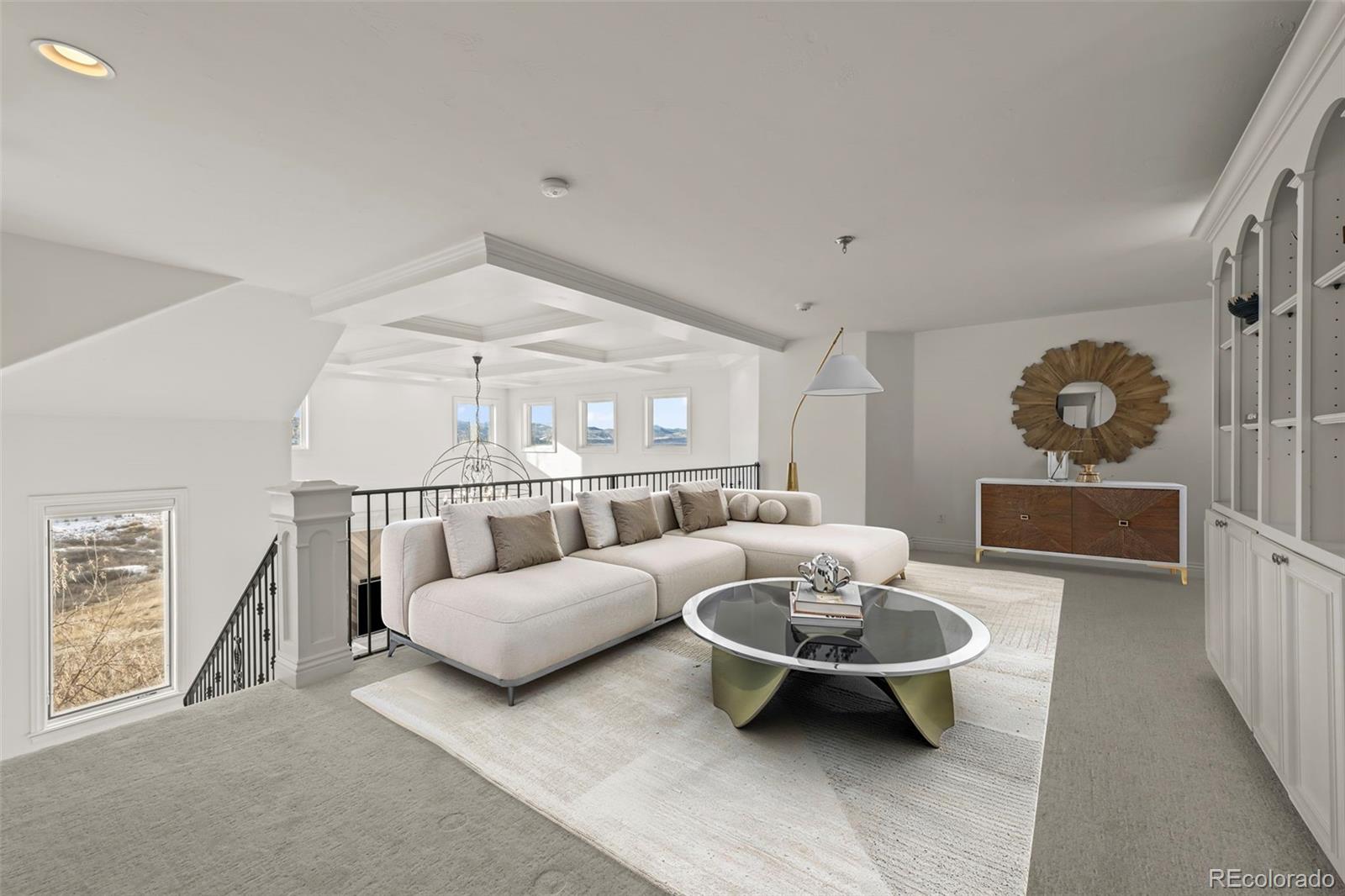 1012 Michener Way Highlands Ranch, CO 80126 - Photo 23 of 50 a living room with furniture and a table