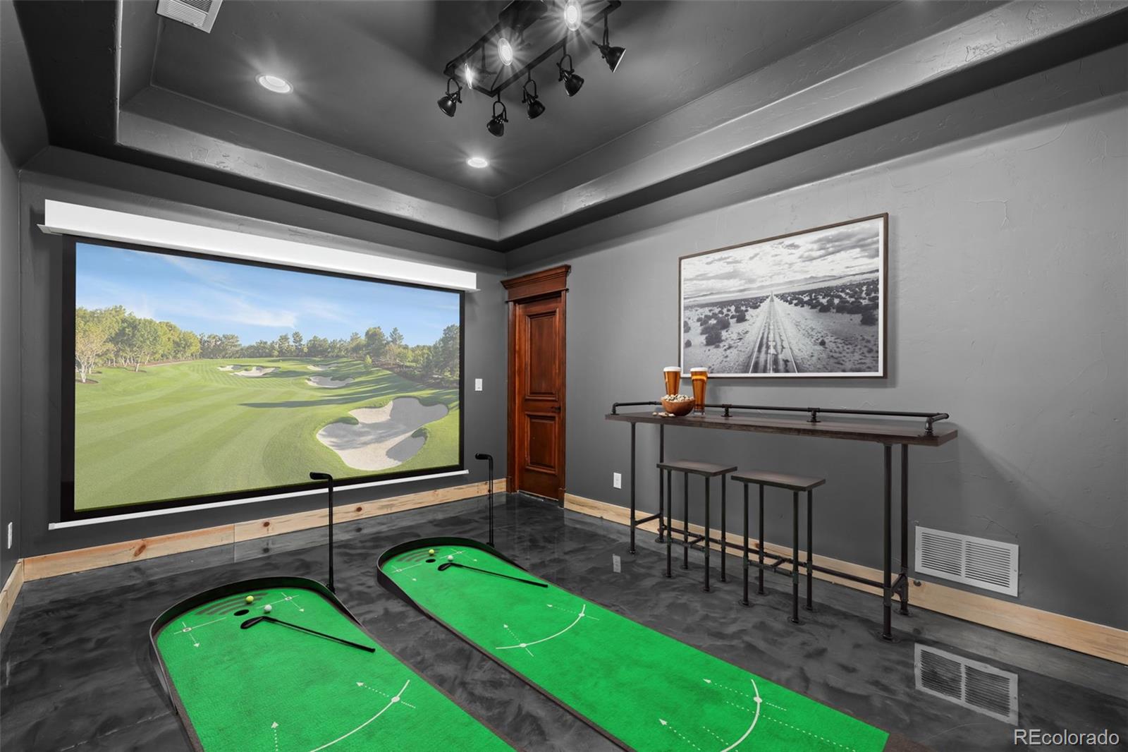 1012 Michener Way Highlands Ranch, CO 80126 - Photo 39 of 50 a room with furniture and a flat screen tv