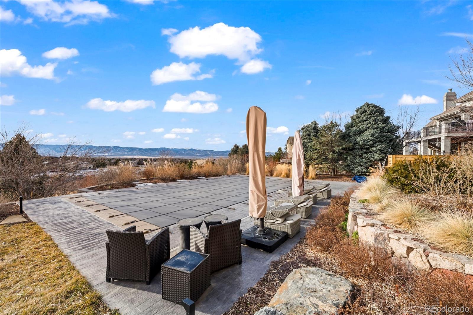 1012 Michener Way Highlands Ranch, CO 80126 - Photo 42 of 50 a view of roof with sitting area