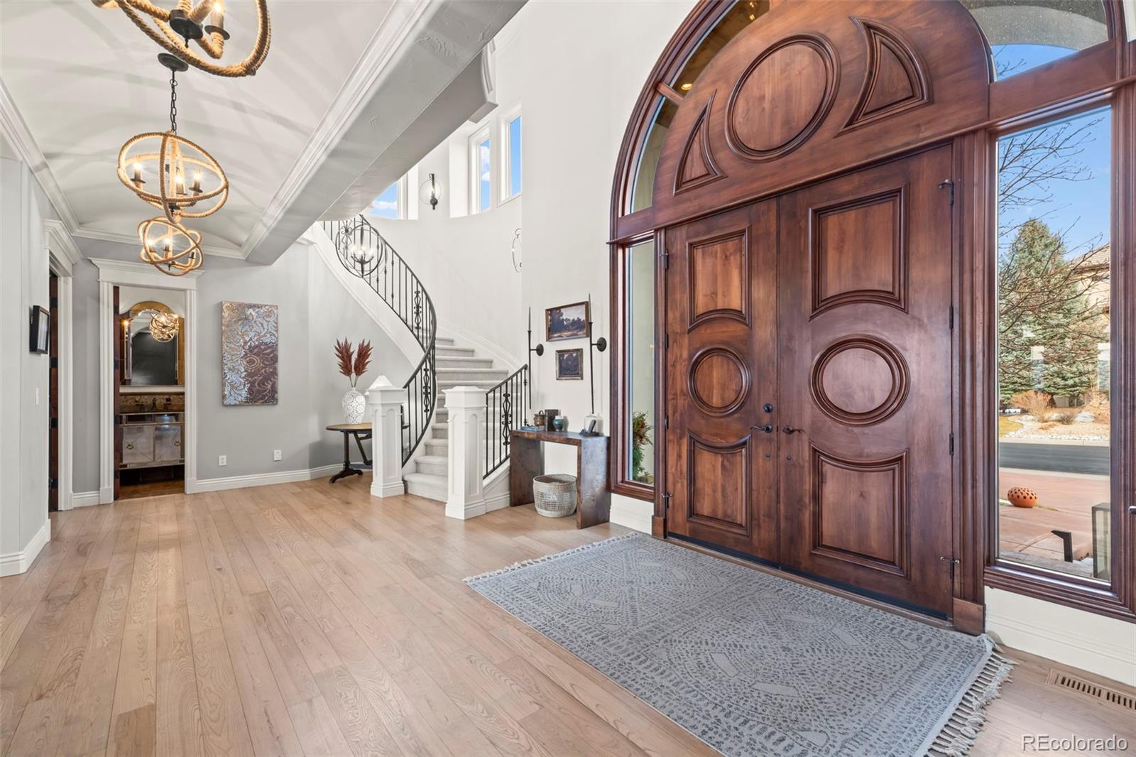 1012 Michener Way Highlands Ranch, CO 80126 - Photo 5 of 50 a view of a hallway with washer and dryer