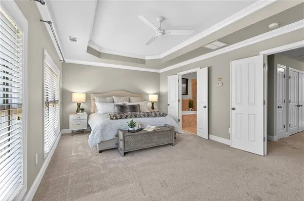 a bed room with furniture and white walls