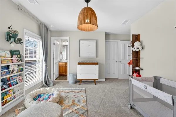 a room with toys and dresser