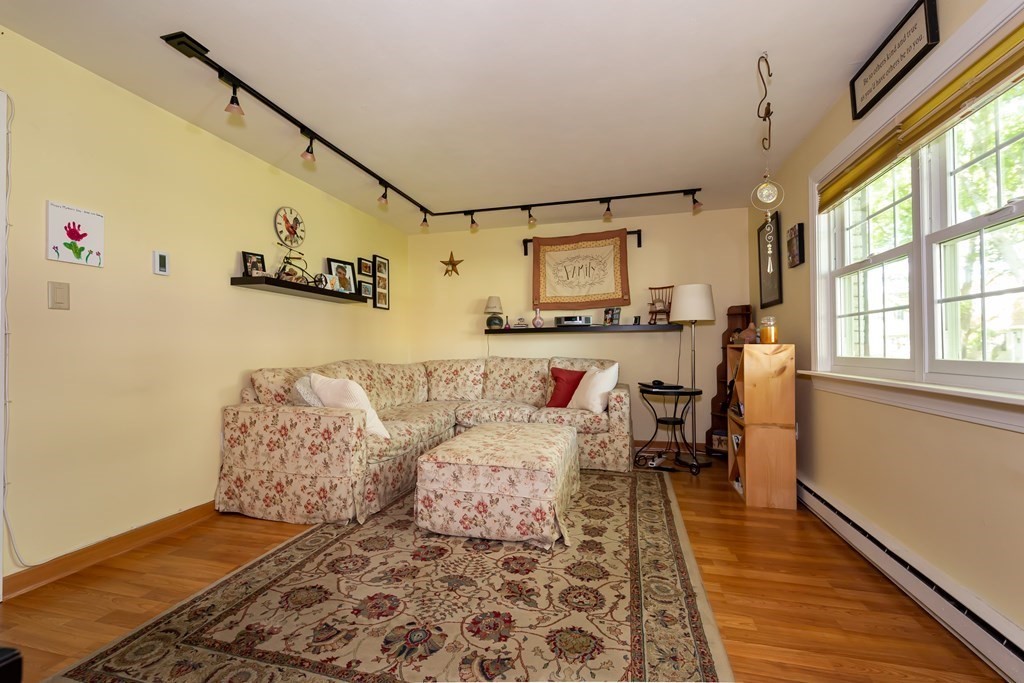 130 Old Ferry Road, Unit B Haverhill, MA 01830 - Photo 15 of 30 a living room with furniture and a rug